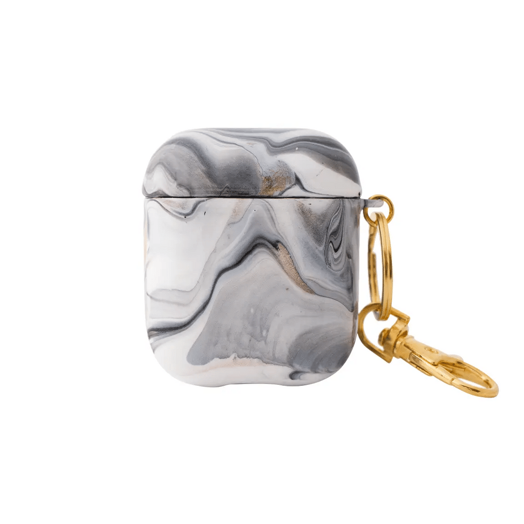 Funda para proteger AirPods, pintada a mano por Ana Tere Canales. Un diseño inspirado en la elegancia del mármol con colores blanco, negro y rose gold.
