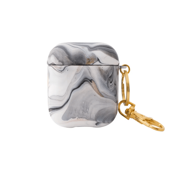 Funda para proteger AirPods, pintada a mano por Ana Tere Canales. Un diseño inspirado en la elegancia del mármol con colores blanco, negro y rose gold.