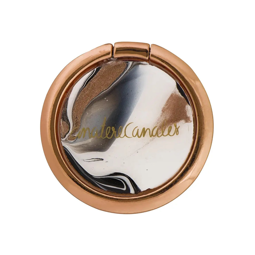 Holder para sostener tu celular, pintado a mano por Ana Tere Canales. Un diseño inspirado en la elegancia del mármol con colores blanco, negro y rose gold.