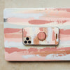 Fundas para MacBook y iPhone Cinnamon Swing pintadas a mano por Ana Tere Canales. Un diseño artístico de pinceladas abstractas en tonos cinnamon.