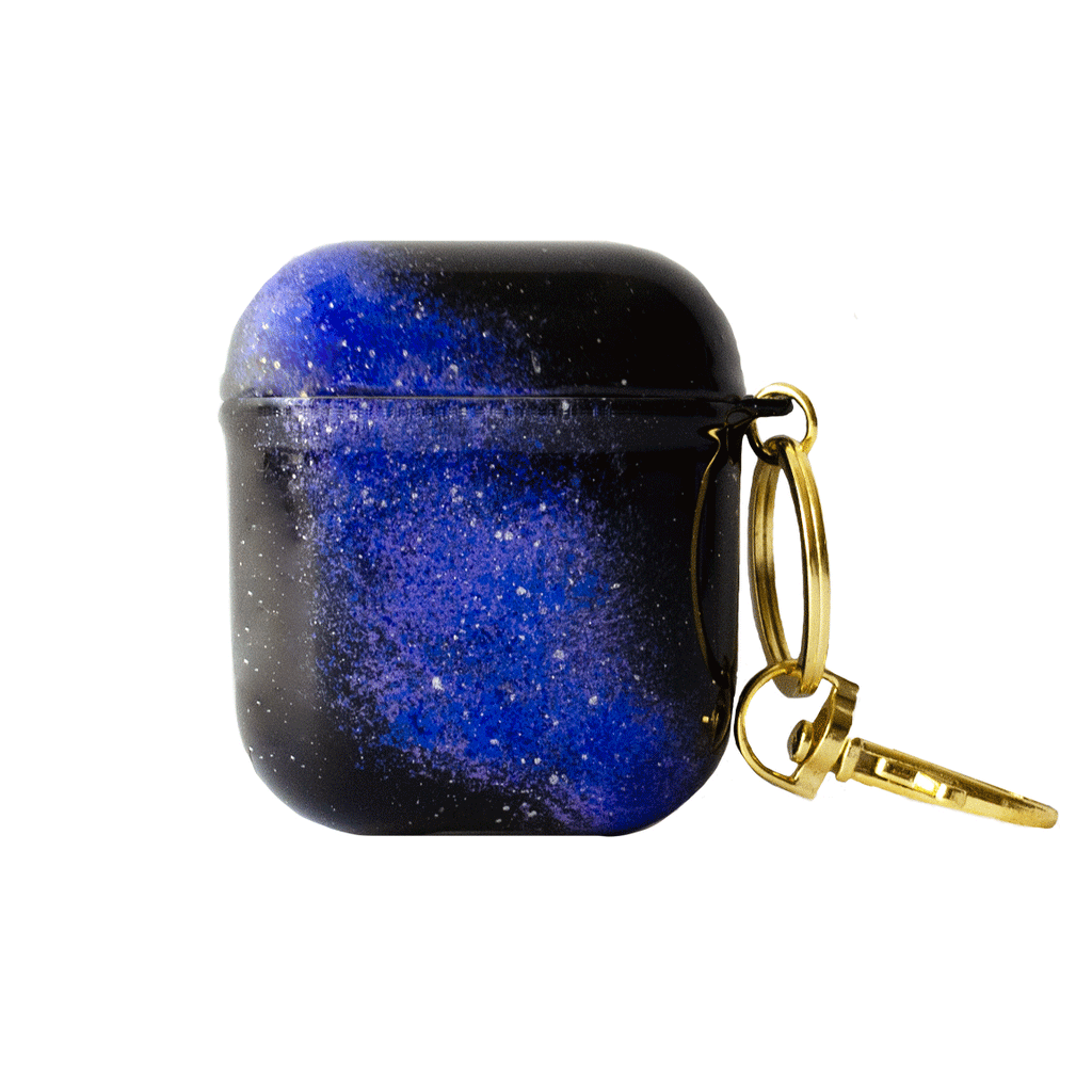 Funda para AirPods Cosmic Reaction pintada a mano por Ana Tere Canales. Un diseño artístico inspirado en galaxias, nebulosas y el universo en tonos vibrantes.