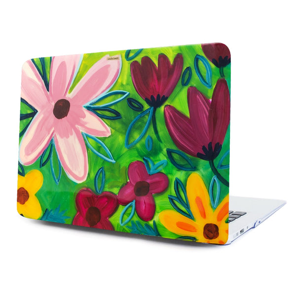 Funda para proteger MacBook, pintada a mano por Ana Tere Canales. Un diseño de flores.