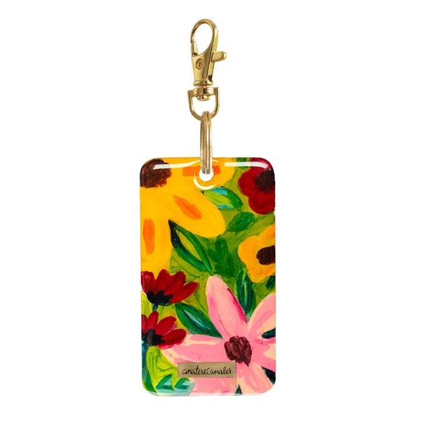 Llavero pintado a mano por Ana Tere Canales. Un diseño de flores.