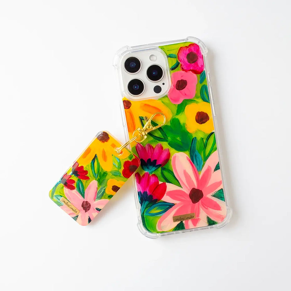 Llavero y funda para proteger iPhone, pintadas a mano por Ana Tere Canales. Un diseño de flores.