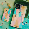 Funda para iPhone y llavero Golden Hour pintada a mano por Ana Tere Canales. Un diseño artístico en tonos dorados inspirado en la luz del atardecer.