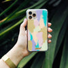 Funda para iPhone Golden Hour pintada a mano por Ana Tere Canales. Un diseño artístico en tonos dorados inspirado en la luz del atardecer.