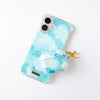 Fundas para proteger iPhone y AirPods, pintadas a mano por Ana Tere Canales. Un diseño con color blanco, aqua y celeste, representando nubes.