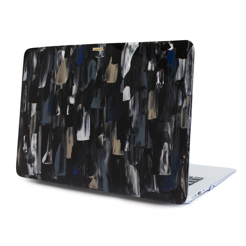 Funda para MacBook Huasteca Illusion pintada a mano por Ana Tere Canales. Diseño abstracto inspirado en la Huasteca de Monterrey y efecto de ilusión visual.