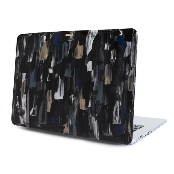 Funda para MacBook Huasteca Illusion pintada a mano por Ana Tere Canales. Diseño abstracto inspirado en la Huasteca de Monterrey y efecto de ilusión visual.