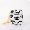 Funda para proteger AirPods. Un diseño de ojos pintado a mano por Ana Tere Canales.