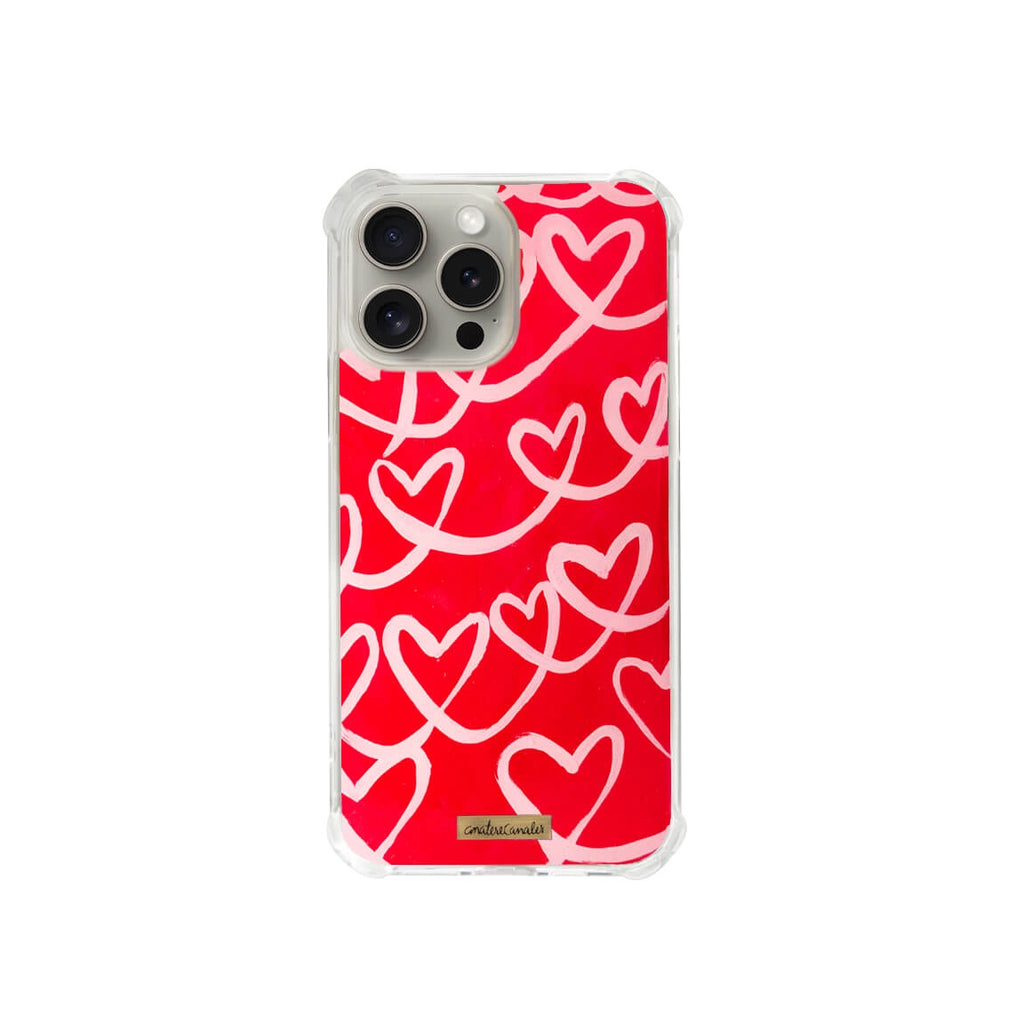 Funda para proteger iPhone, pintada a mano por Ana Tere Canales. Un diseño de corazones en rosas y rojos.