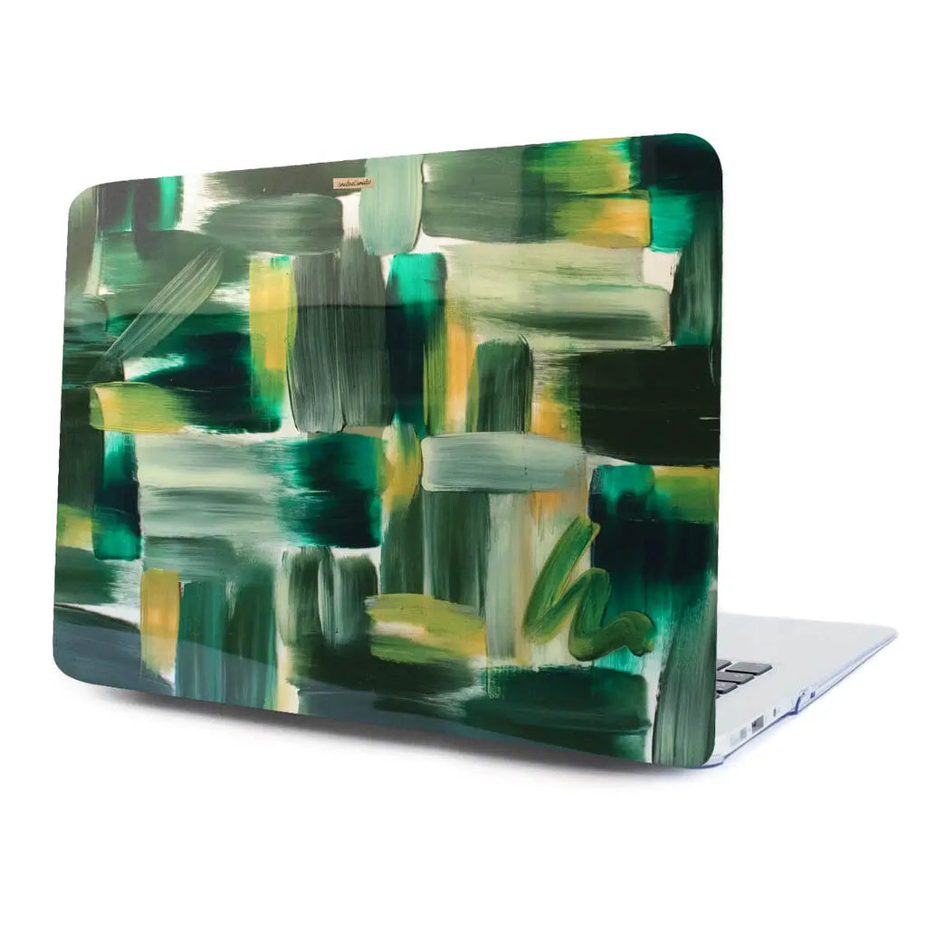 Funda para proteger tu macbook, pintada a mano por Ana Tere Canales. Un diseño en tonos verdes con toques dorados.