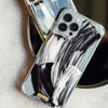 Fundas para proteger iPhone, pintadas a mano por Ana Tere Canales. Un diseño monocromático moderno.