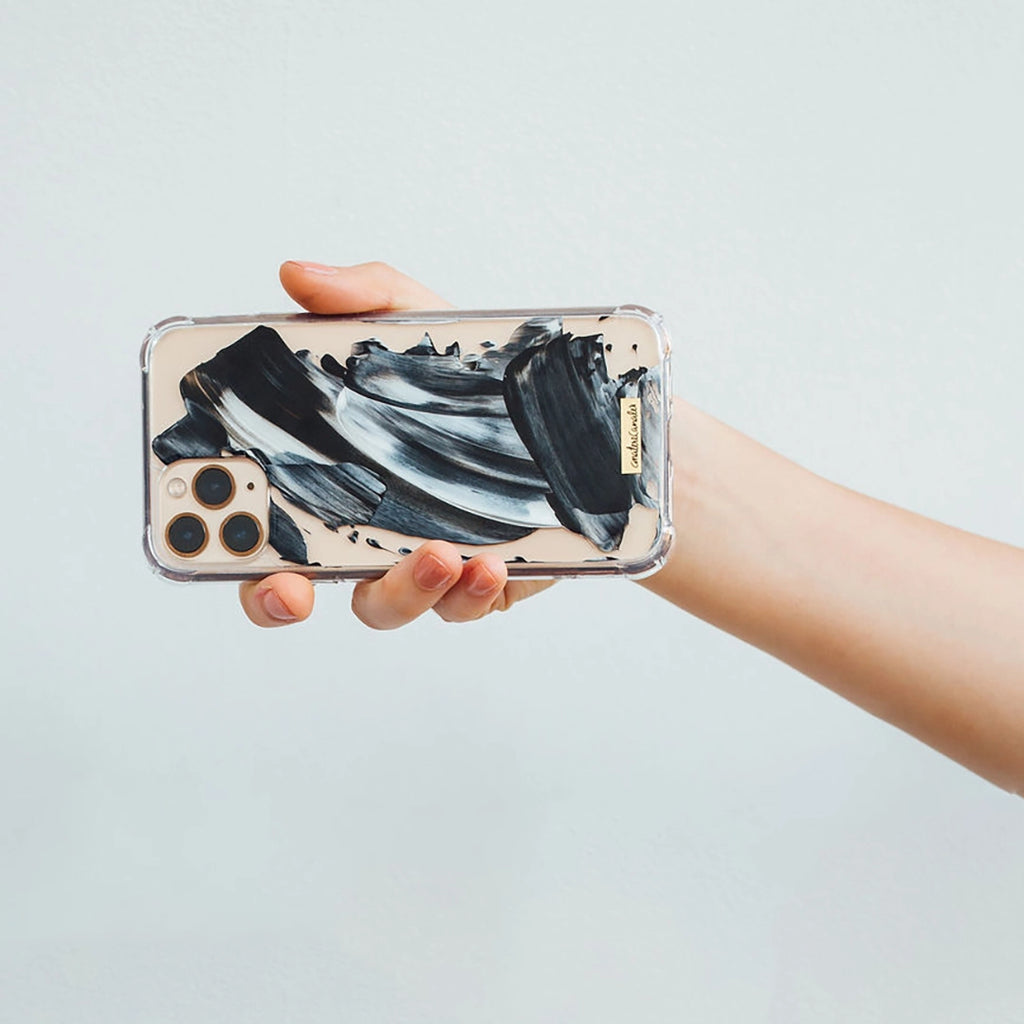 Funda para proteger iPhone, pintada a mano por Ana Tere Canales. Un diseño monocromático moderno.