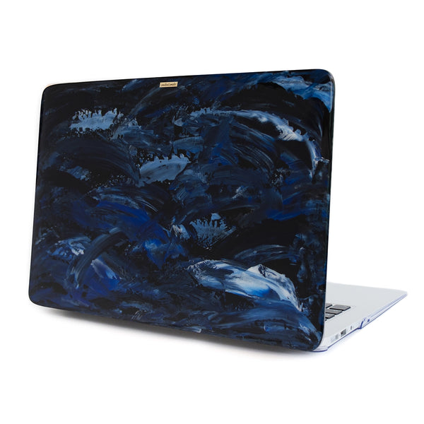 Funda para MacBook Pacífico pintada a mano por Ana Tere Canales. Un diseño artístico inspirado en el océano en tonos azules.