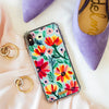 Funda para iPhone Paraíso pintada a mano por Ana Tere Canales. Un diseño artístico inspirado en un paraíso tropical en tonos azul, verde y arena