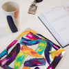Funda para MacBook Rainbow Paint Me con pinceladas multicolor inspiradas en creatividad, pasión y expresión artística. Pintadas por Ana Tere Canales.