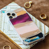 Funda para iPhone Sunset in Autumn pintada a mano por Ana Tere Canales. Un diseño artístico inspirado en un atardecer de otoño en tonos cálidos.