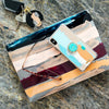 Fundas para MacBook y iPhone Sunset in Autumn pintada a mano por Ana Tere Canales. Un diseño artístico inspirado en un atardecer de otoño en tonos cálidos.