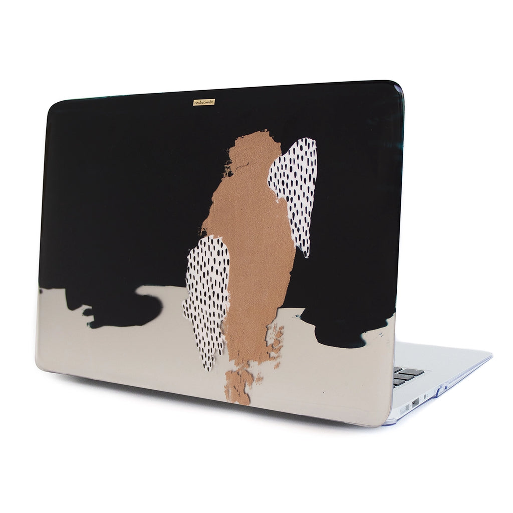 Funda para MacBook Zebra pintada a mano por Ana Tere Canales. Un diseño artístico inspirado en el estampado zebra en blanco y negro.